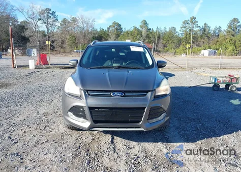 2014 Ford Escape Titanium z USA, uszkodzony, nr VIN 1FMCU0JX3EUB34011